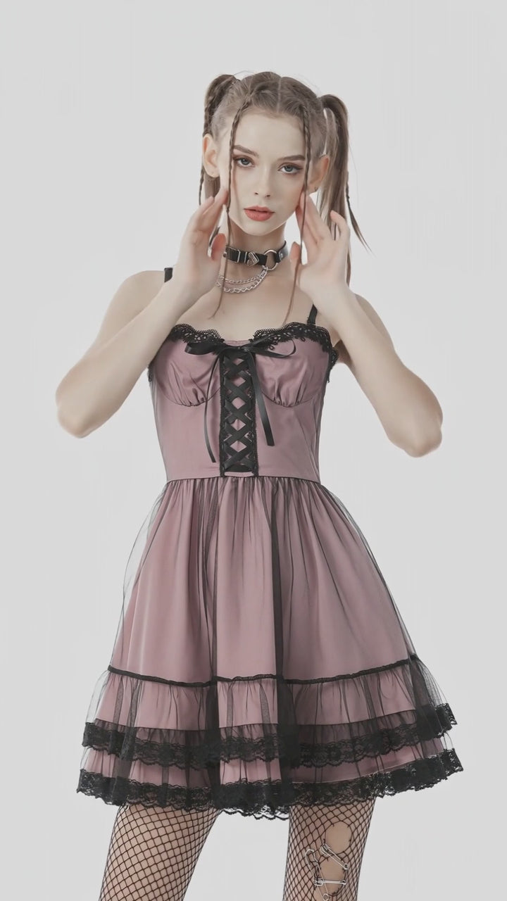 Model wearing the pink and black lace-trim Cool Mesh Pink Doll Dress.